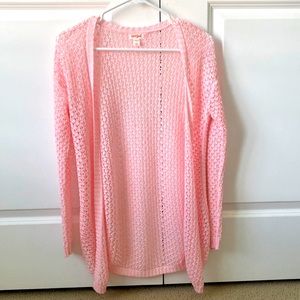 This is a pink Cat and Jack sweater from Target, it’s a size 10/12 in girls.